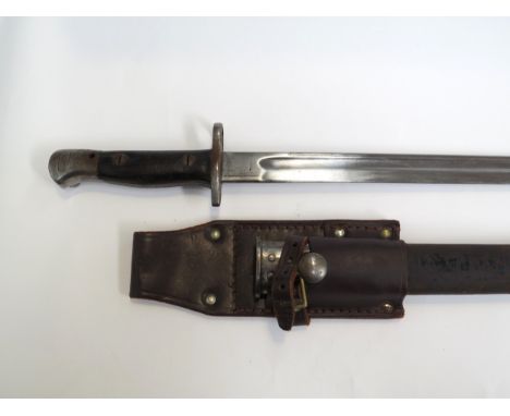 A WWI British 1907 pattern Sanderson bayonet stamped 10 17, with scabbard and frog