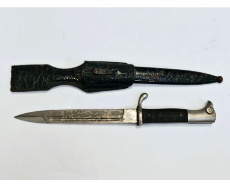 A Third Reich era German presentation dress bayonet, engraved 'Bur Erinnerung an Meine Dienstzeit', blade by Carl Eickhorn, S