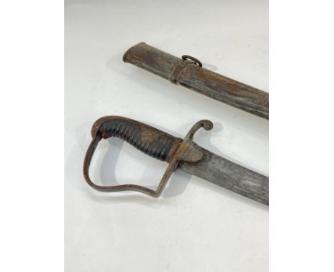 A late 18th / early 19th Century cavalry sabre, with scabbard, possibly Prussian
