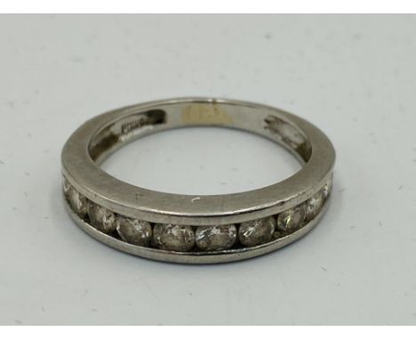 Platinum and diamond half eternity ring, 4.3g, size L. Estimate: £70-100