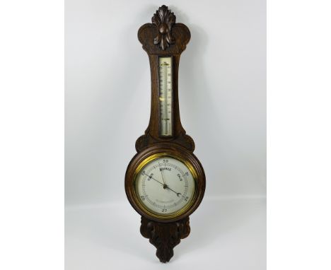 Barometer and mercury thermometer on oak backboard, 86cms. Estimate £15-40.