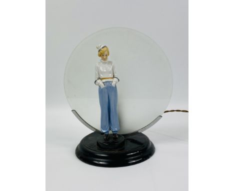 Mid century table lamp with glass shade and ceramic figure on wood base, 26cms. Estimate £20-40.