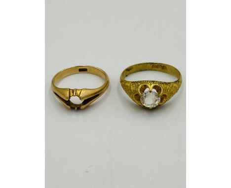 15ct gold ring with stone missing, 3.8g; together with a yellow metal ring set with a paste stone. Estimate: £100-120