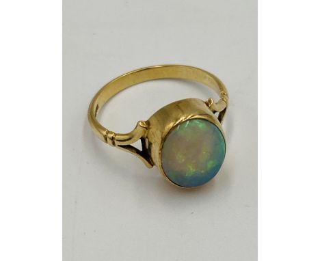 9ct gold ring set with a pale opal, 2.2g, size N1/2. Estimate: £40-60