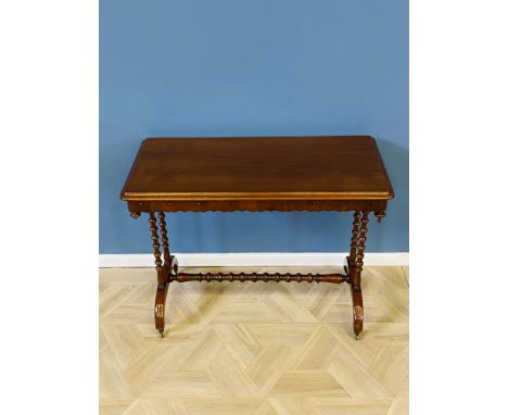 Victorian mahogany stretcher table with bobbin end supports and bobbin stretcher with corner finials and brass cup castors, 1