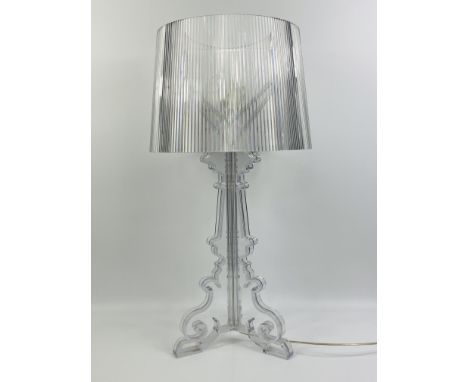 Kartell Bourgie table lamp, with a clear frame and shade, designed by Ferruccio Laviani , 73cms. Estimate £40-60.