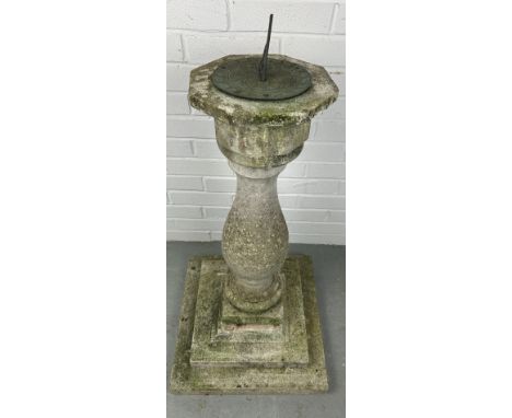 A LARGE STONE SUNDIAL, Dated 1793 'Time Flyes', but later.Diameter of top: 25cm Diameter of base: 45cm 