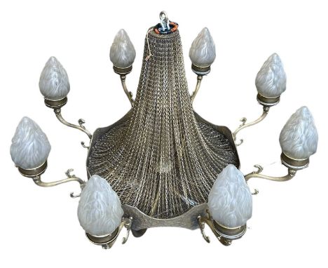 A LARGE CHANDELIER EIGHT ARM CHANDELIER WITH GLASS SHADES OF FLAME FORM 135cm x 100cm From a film production.