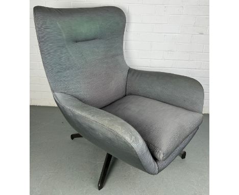 A SWIVEL CHAIR BY MINOTTI RAISED ON FOUR 'TRIPOD' LEGS97cm x 80cm x 80cm 