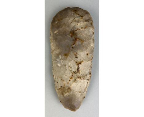 A NEOLITHIC FRENCH FLAKED FLINT AXE, 15cm L x 6.5cm W