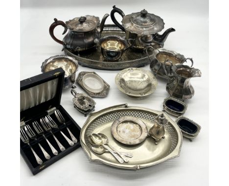 A collection of silver plated items including two teapots, tray, salts etc.