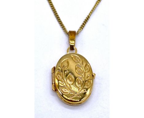 A 9ct gold locket and chain, total weight 2.7g