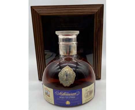 A Limited edition Famous Grouse "The Millennium Open Championship 21 year old Reserve Scotch Whisky" in etched Caithness crys