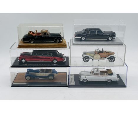 A collection of six cased Rolls Royce die-cast models including an 1962 Silver Cloud Limousine, 1966 Phantom V Mulliner Landa