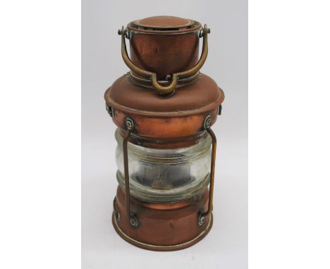An antique copper and brass ship's lantern