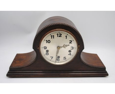 A vintage chiming mantel clock