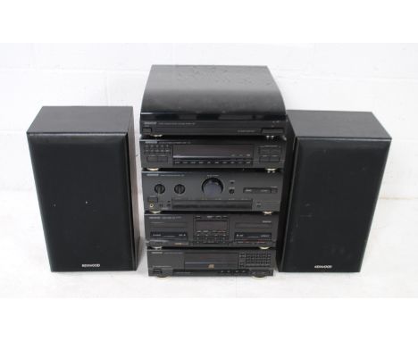 A Kenwood stacking hi-fi system, comprising a P-25 automatic turntable, T-47L tuner, A-54 integrated amplifier, X-54 double c
