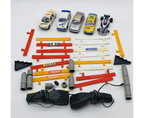 A collection of Scalextric including five racing cars, two controllers, barriers, power pack and large crate of track