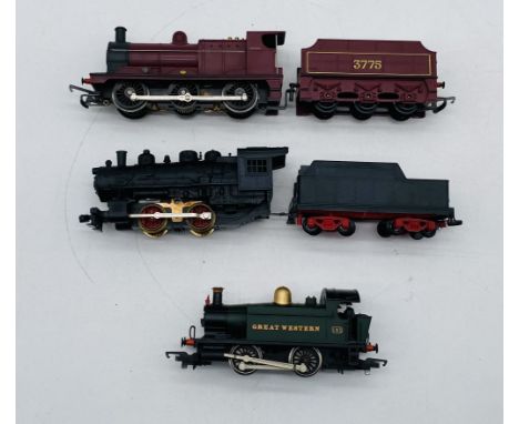 A collection of three unboxed model railway OO gauge steam locomotives including a Hornby 0-4-0 Great Western locomotive (101