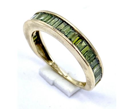 A 9K gold green diamond channel set half eternity ring, Size N, 2.7 grams 