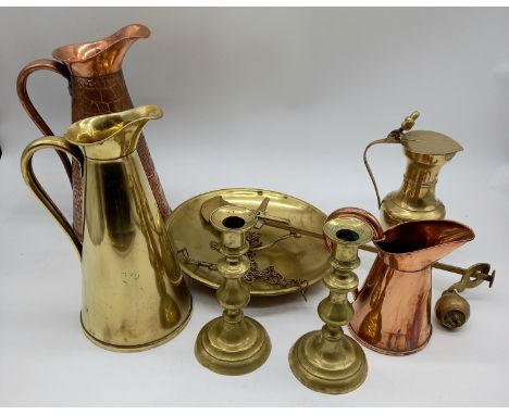 A collection of assorted brass and copper to include jugs, scales etc.
