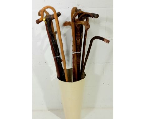 A collection of assorted walking sticks etc, to include a 9ct gold tipped walking stick.