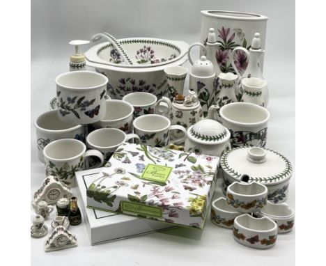 A collection of Portmeirion Botanic Garden tableware including large lined dish, ladle, vases, cups, jars, miniature clocks e
