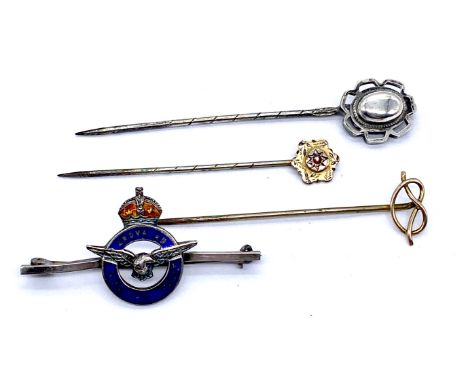 An enamelled Sterling silver RAF brooch "Per Ardva Ab Astra", a silver stick pin,9ct gold topped stick pin and one other
