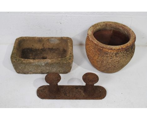 A small reconstituted stone garden trough, along with a weathered pot etc.