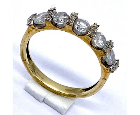 A diamond five stone ring with diamond infills set in 9ct gold, size N 1/2