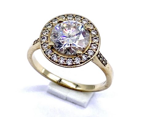 A 9K gold Mossanite ring centre stone approximately 2ct, Size N, 3.0 grams total.