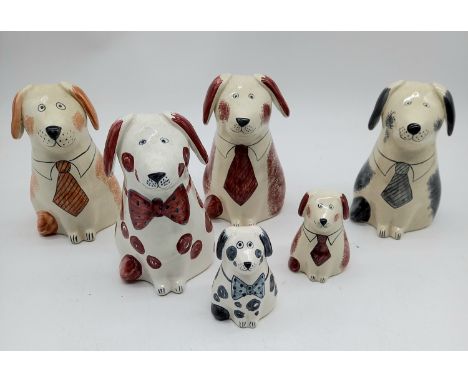 A collection of assorted Rye pottery hand painted dogs.