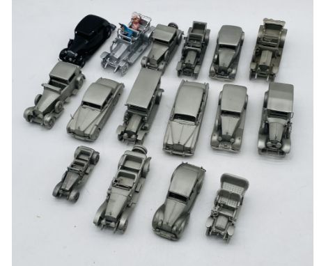 A collection of Danbury Mint pewter Rolls Royce model cars including 1968 Phantom VI, 1952 Silver Cloud III, 1936 Park Ward B