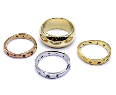 A Viorelli 925 silver gold plated band ring and a set of three silver 925 stacker rings in three coloured gold plated. size R