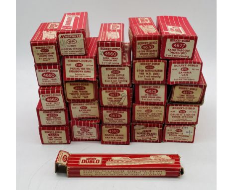 A collection of boxed Hornby Dublo OO gauge 3-rail rolling stock including wagons, goods brake vans, tank wagons, horse box, 