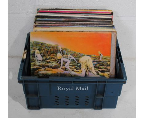 A quantity of various 12" vinyl records, including Led Zeppelin, Humble Pie, The Rolling Stones, The Beatles, The Who, Joni M