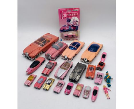 A collection of various Thunderbirds Lady Penelope's Fab 1 cars including die-cast, plastic toys, pewter, ceramic money box e