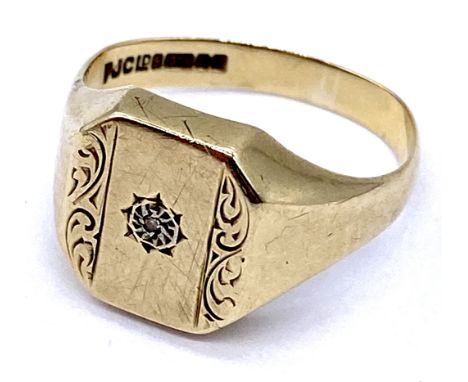 A 9ct gold signet ring set with a diamond, weight 4.2g, size R 1/2