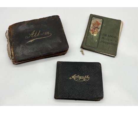 Two early 20th century autograph books containing numerous poems, drawings and paintings along with a first edition copy of "