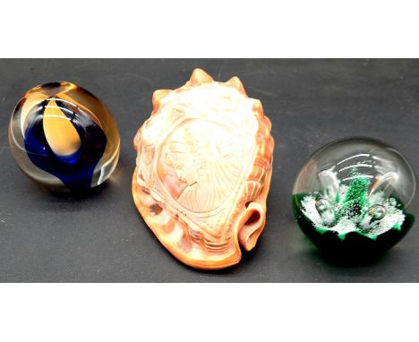 A vintage Caithness paperweight Organza, another Moonflower and a carved cameo shell.