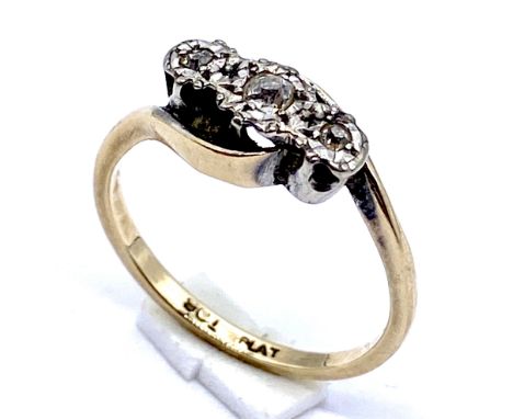 A 9ct gold and platinum diamond three stone ring, size M 1/2, weight 2.4g