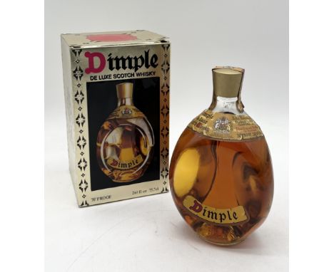 A boxed Dimple De Luxe Scotch Whisky, 70% proof, circa 1970's