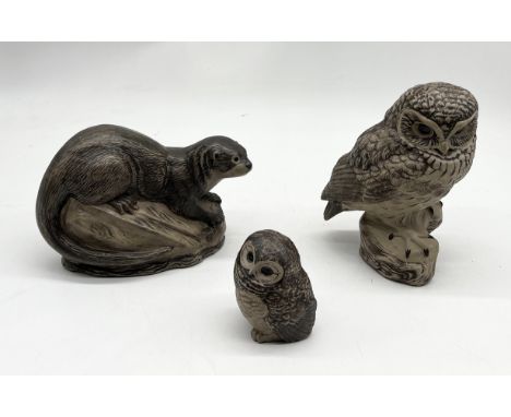 Two Poole Pottery stoneware figures of an otter and owl by Barabara Linley Adams along with a smaller owl example