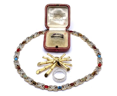A platinum eternity ring set with diamonds and rubies (size L, weight 3g) in antique leather box- 1 diamond missing along wit