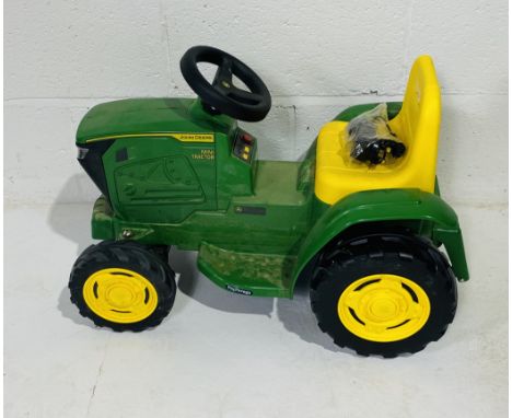 A child's battery operated John Deere Mini-Tractor by Peg Perego with charging cable - untested