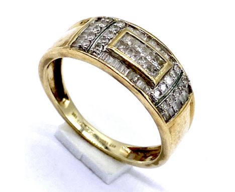 A 10K gold dress ring set with numerous diamonds in varying cuts, size N 1/2, weight 3.1g