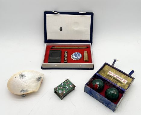 A collection of Chinese items including footed shell dish with silver coloured letters, cloisonne matchbox holder, stamp set 