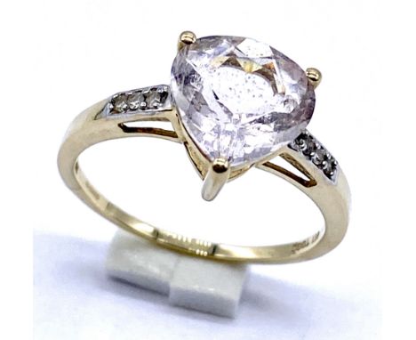 A 10K/375 gold Trilliant cut white quartz ring, Size N1/2, 2.2 grams total.