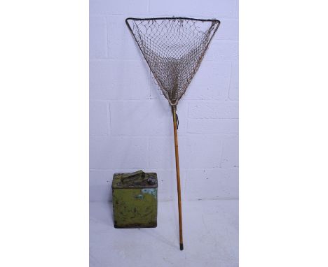 An antique folding landing net, along with a vintage metal Esso petrol can