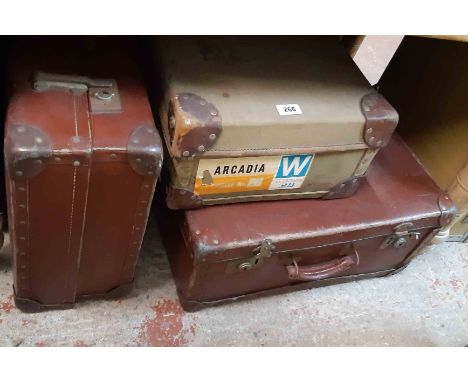 A vintage Tizlite aluminium bound suitcase - sold with Beales of Bournemouth suitcase with leather bound corners, a travellin